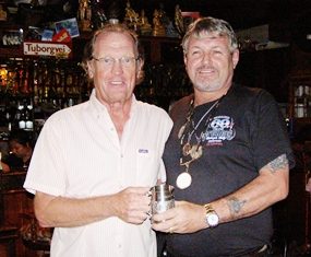 Peter Hammond (left) receives his Cafe Kronborg December Monthly Mug from Bjarne.